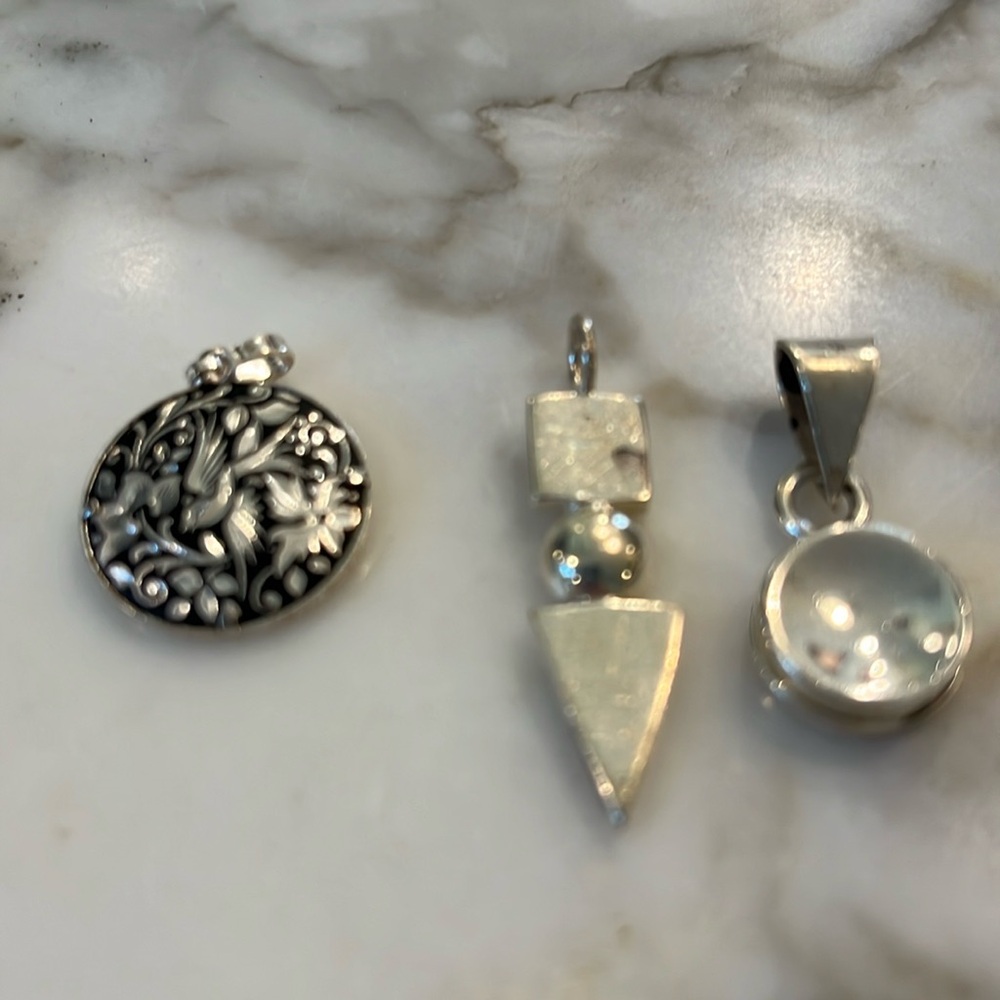 Silver necklace pendants